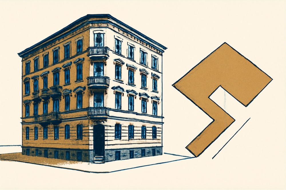 Corner apartment building and plot outline illustrating land vs building