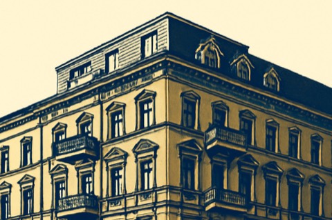 Berlin corner Altbau with modern rooftop extension, symbolising newly created units