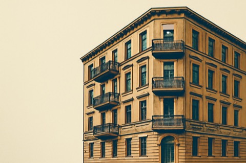Berlin corner apartment building facade, two‑colour illustration