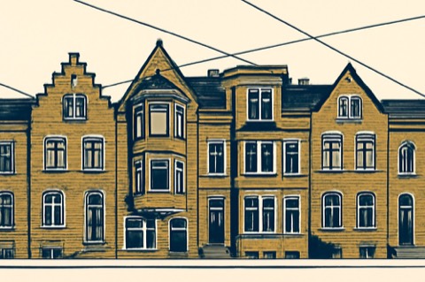 Historic brick apartment façades in Bremen with bay windows and gables